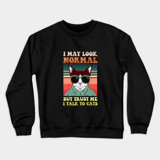 I May Look Normal But I Talk To Cats Crewneck Sweatshirt